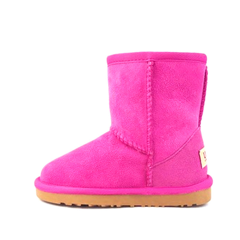 Pink UGG Kids Short Classic Boots by Auzland featuring soft sheepskin lining and durable rubber soles.