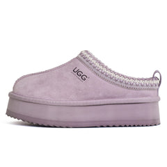 Auzland Mackenzie Platform UGG slippers with plush lining and chunky soles, shown from a side angle.