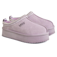 Auzland Mackenzie Platform UGG slippers featuring plush lining and a thick platform sole, ideal for comfortable indoor wear.