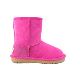 Pink UGG Kids Short Classic Boots by Auzland, cosy sheepskin-lined shoes for children with a soft, stylish design.