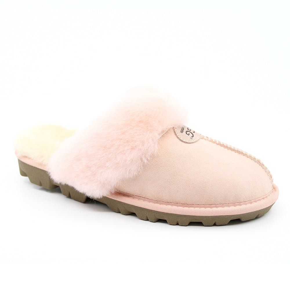 A pair of pink UGG Scuff Slippers for women, cosy slip-on shoes with soft lining and plush exterior, perfect for indoor comfort.