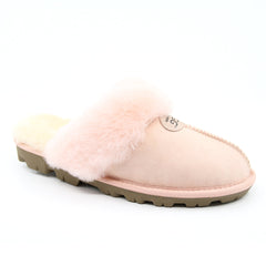 A pair of pink UGG Scuff Slippers for women, cosy slip-on shoes with soft lining and plush exterior, perfect for indoor comfort.