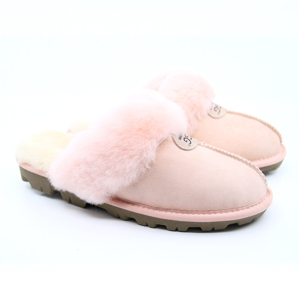 Pink UGG Scuff slippers for women by Auzland, showing cosy slip-on footwear with soft lining and open-toe design.