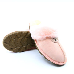 A pair of pink UGG Scuff slippers for women, featuring soft, cosy material and slip-on design perfect for indoor comfort.