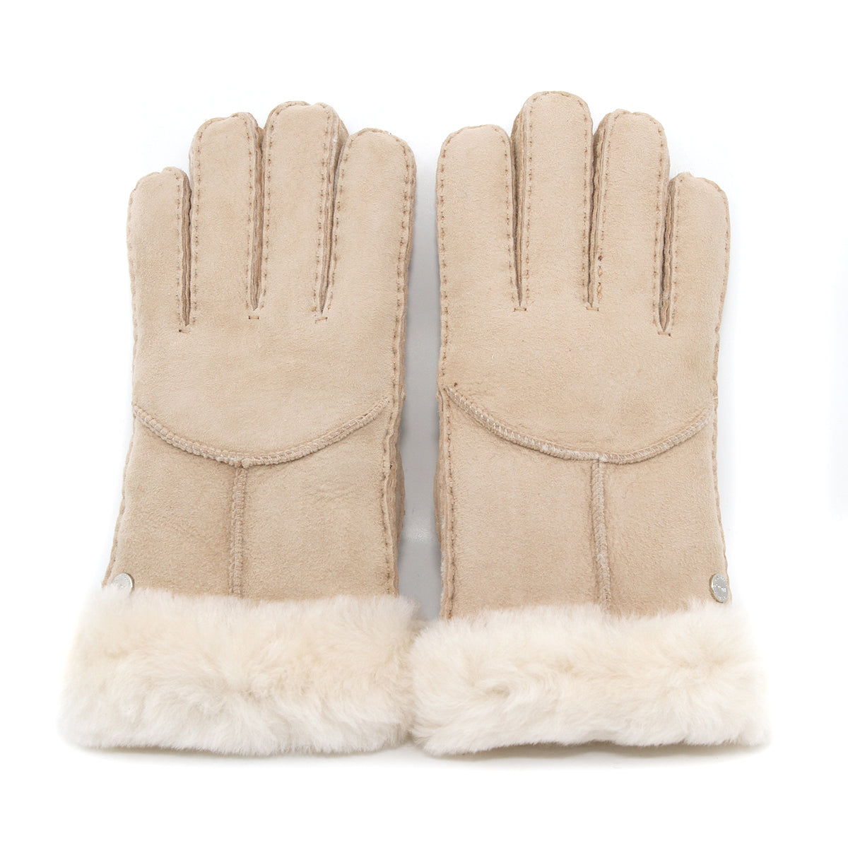 Auzland UGG sheepskin gloves in sand color, close-up showing soft sheepskin material and cosy fit.