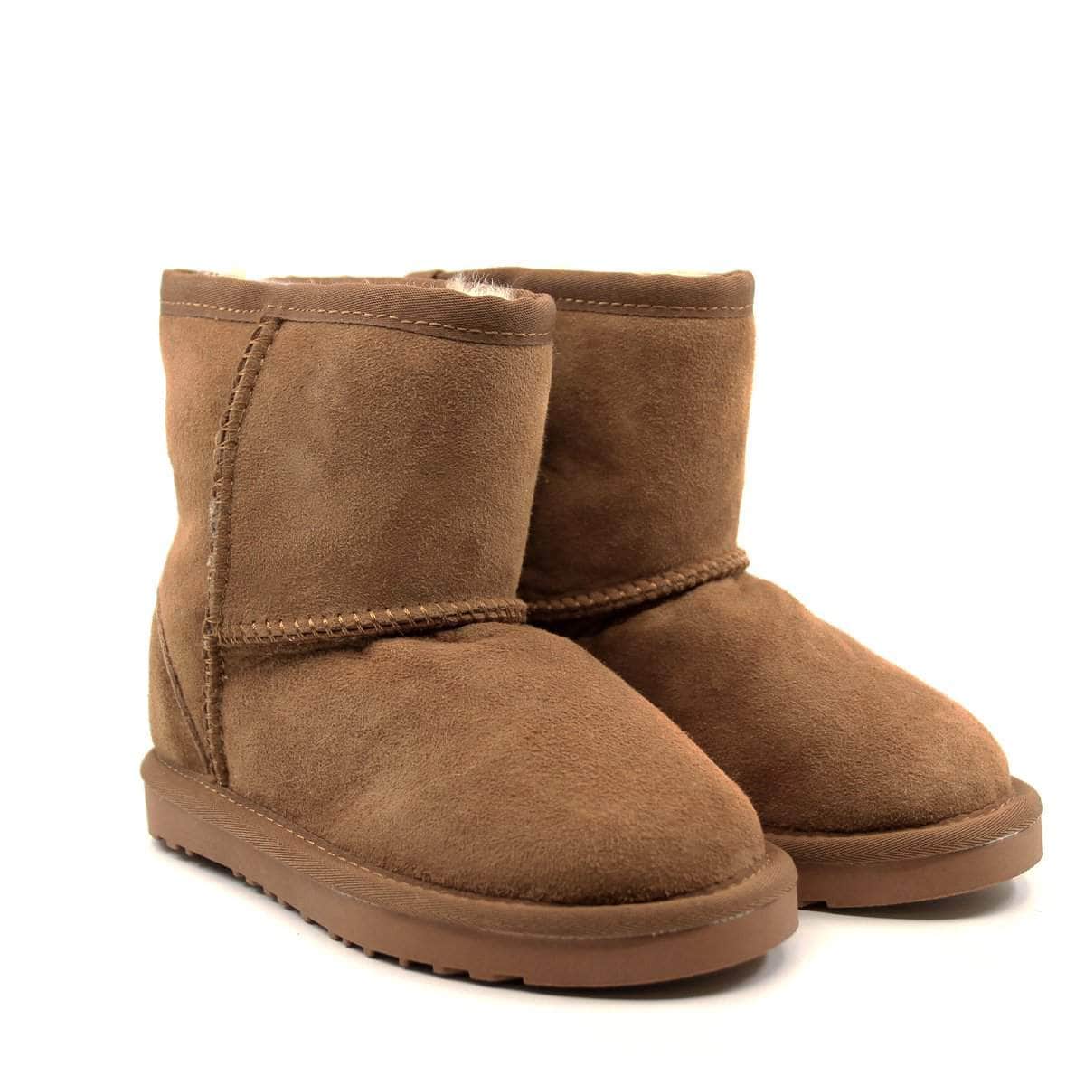 Auzland UGG Kids Short Classic Boots in tan leather with plush shearling lining and durable rubber soles.