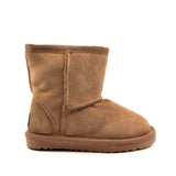 A pair of UGG Kids Short Classic Boots in chestnut color, featuring soft sheepskin lining and a rugged sole for kids' casual wear.