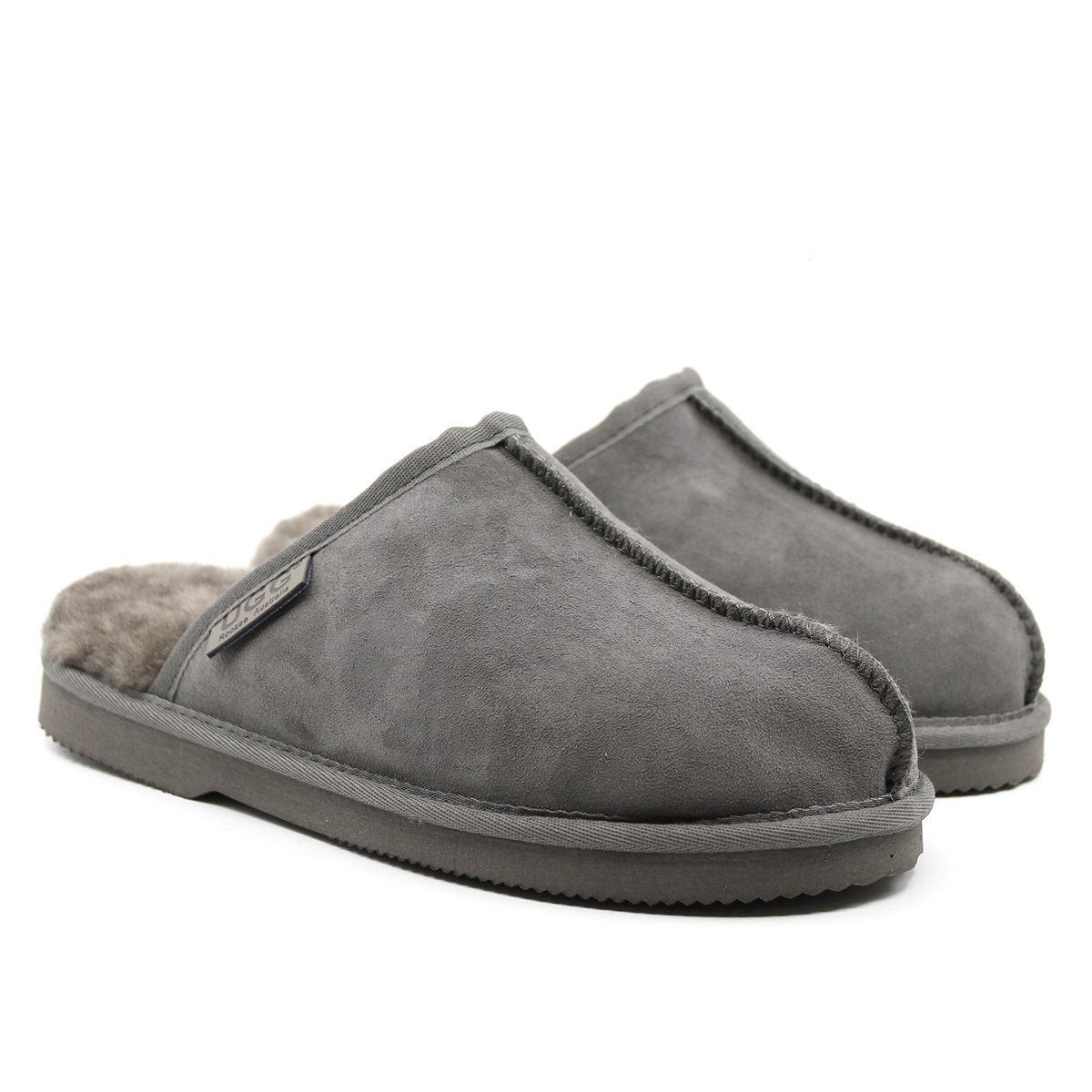 A pair of men's UGG Premium Slippers by Auzland, Australian-made, featuring soft leather and comfortable slip-on design.