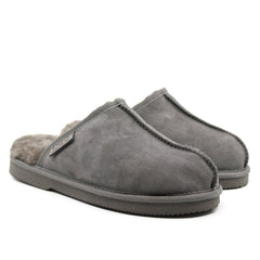 A pair of men's UGG Premium Slippers by Auzland, Australian-made, featuring soft leather and comfortable slip-on design.