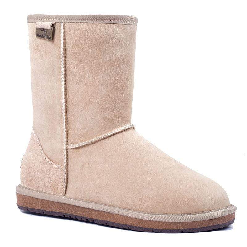 A pair of Auzland premium short classic UGG boots for women in sand color, showcasing cosy sheepskin lining and stylish design.