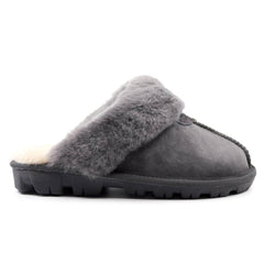 A pair of grey UGG Scuff Slippers for women and men, featuring soft plush material and slip-on design from Auzland.